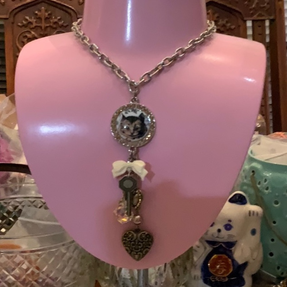 Tarina Tarantino Cheshire Cat charm necklace.